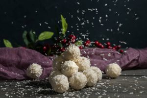 Coconut snowballs on dark background for easter