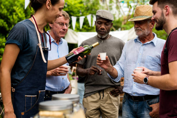 Group of men at a wine festival tasting the finest wines
