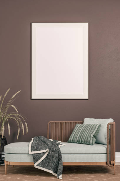 A traditional type of daybed with a brown wall background with white art on it