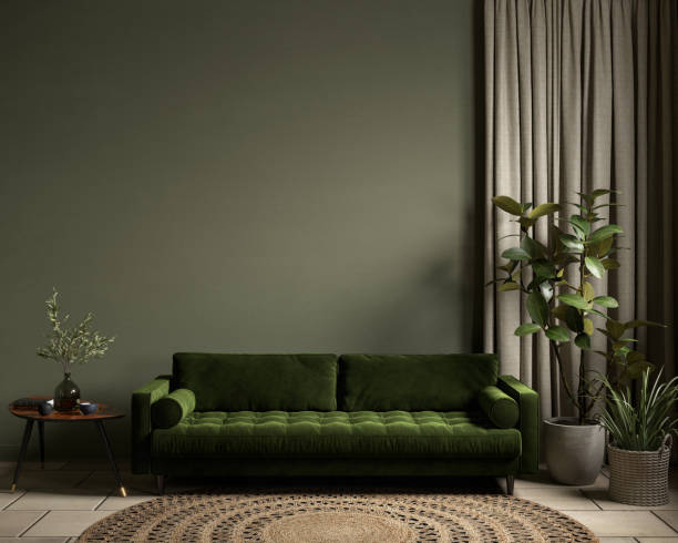 Olive green interior with sofa and decor.