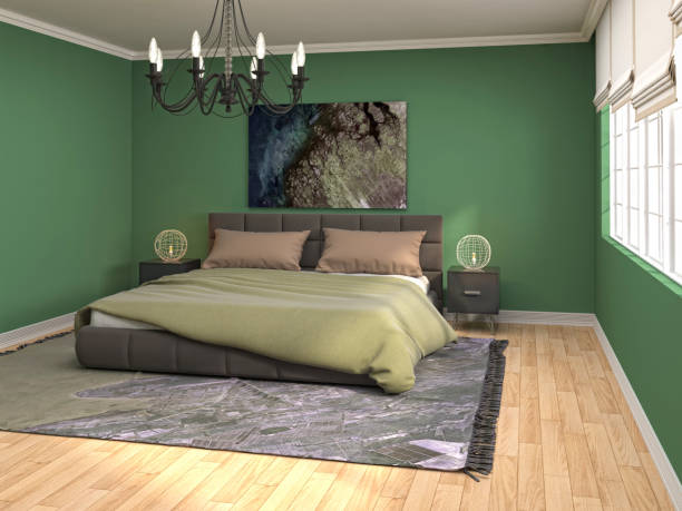 Green Bedroom accent wall with a chandelier 