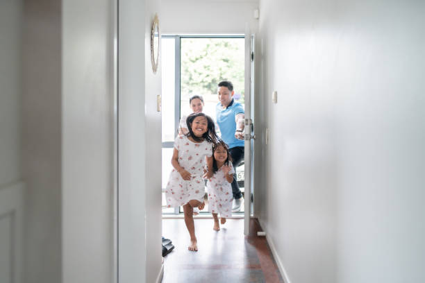 Two sisters one younger and other older are very happy to arrived at new home in Auckland, New Zealand.