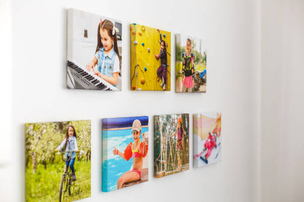 Blank wooden square photo frame modern interior design decorated with wood shelf on white brick wall background with copy space for text or image.