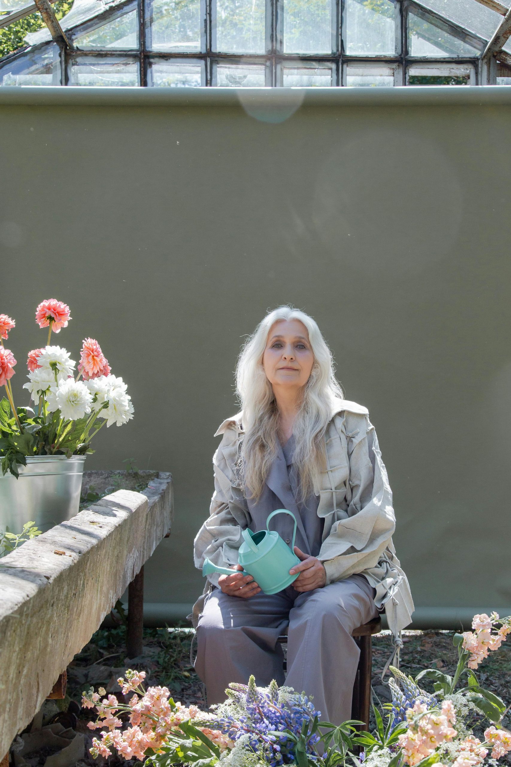 Lady in a gardening stool