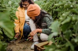 mother and daughter gardening on clay soil